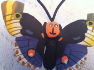 butterfy with smiley face