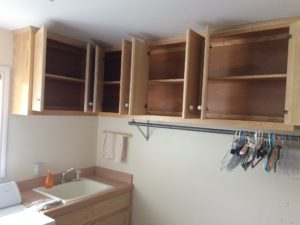 julie laundry room empty small cabinets