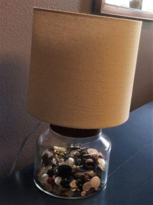 julie laundry room with button lamp