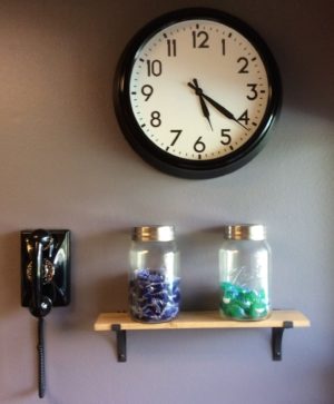 julie laundry room with clock